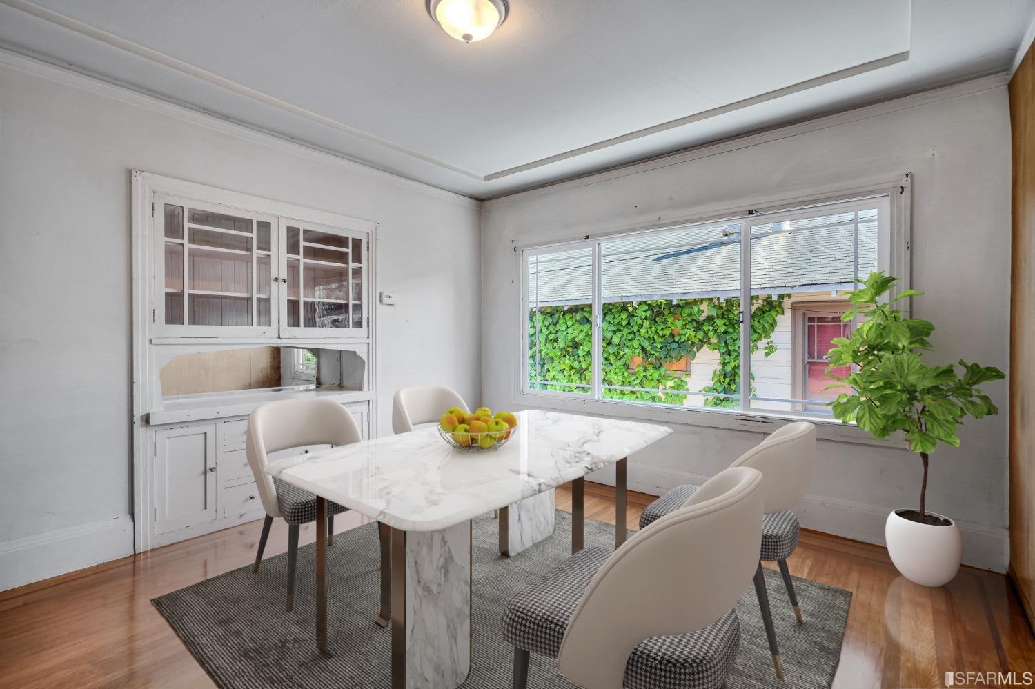 2123 Byron Street Berkeley, CA 94702 - Photo 16 of 54 a view of a dining room with furniture window and wooden floor