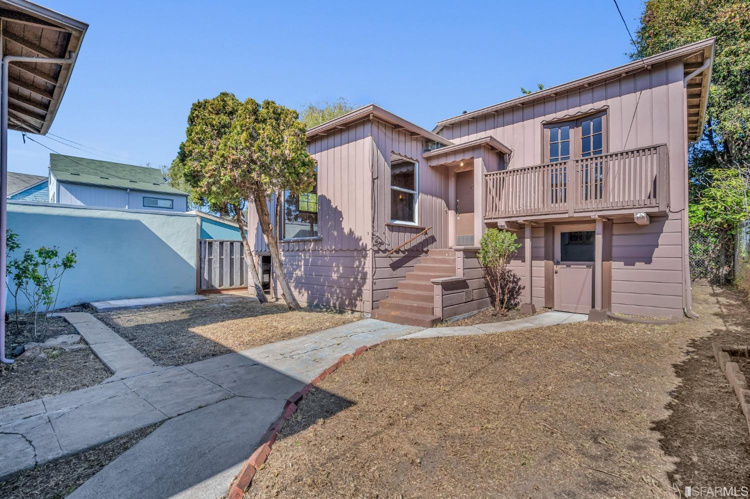 2123 Byron Street Berkeley, CA 94702 - Photo 36 of 54 a view of a house with a yard and potted plants
