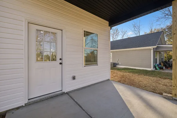 a view of outdoor space and front view of a house