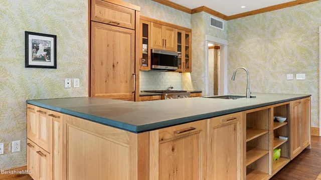 a bathroom with a sink a double vanity and a mirror