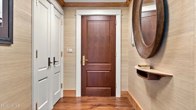 a bathroom with a tub and a window