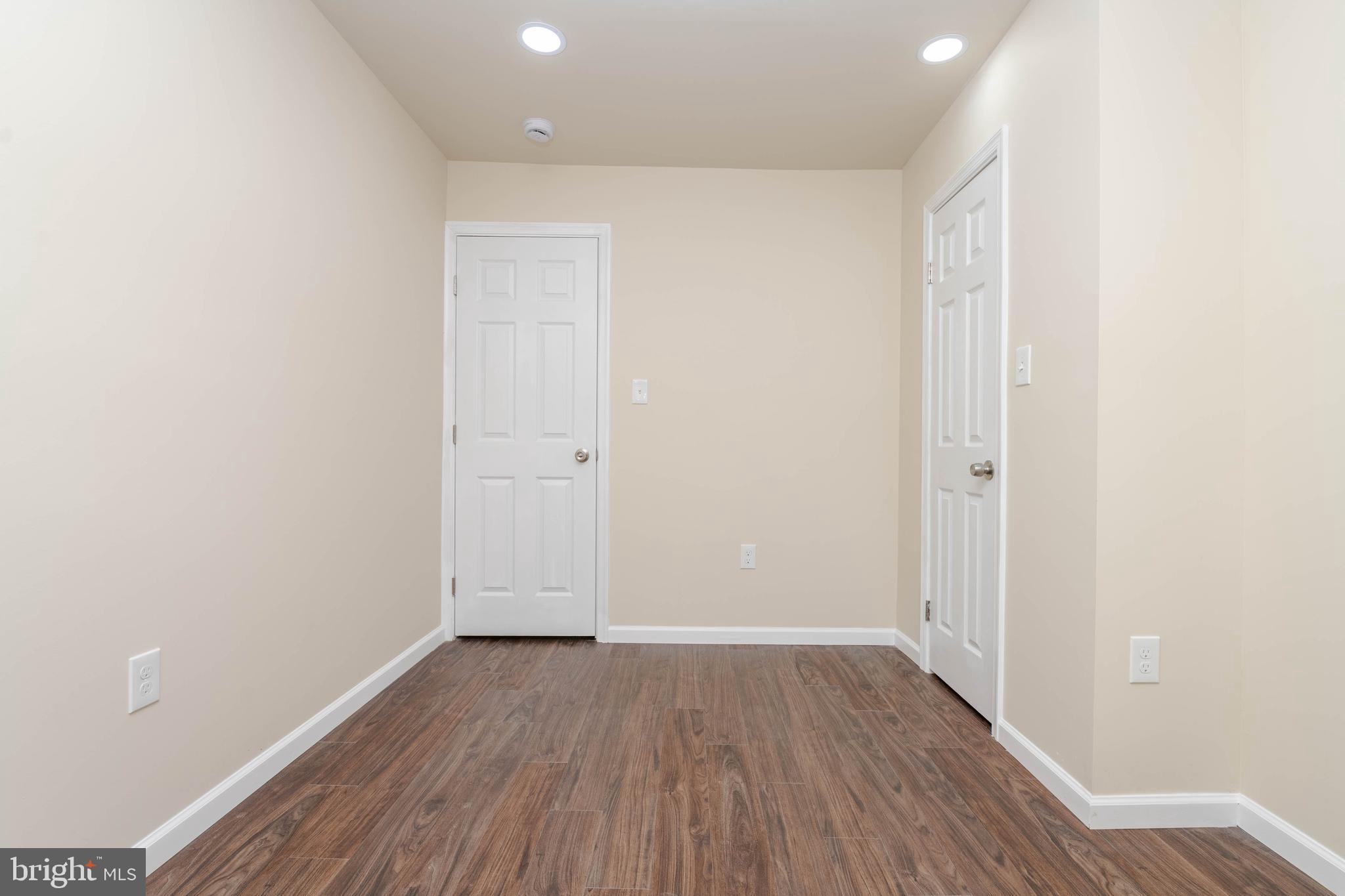 1839 Ramsay Street Baltimore, MD 21223 - Photo 13 of 22 a view of room with wooden floor