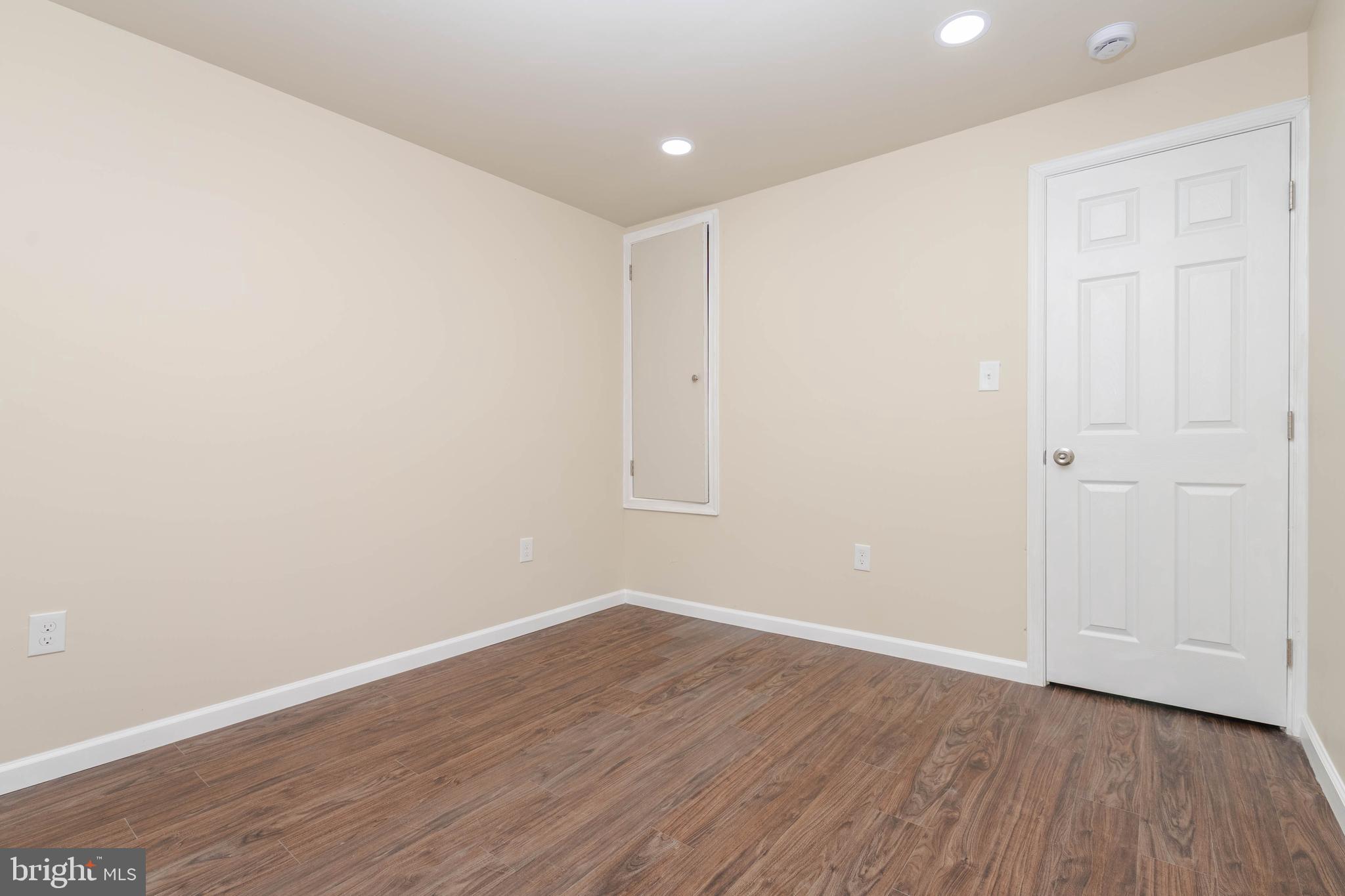 1839 Ramsay Street Baltimore, MD 21223 - Photo 16 of 22 a view of a room with wooden floor