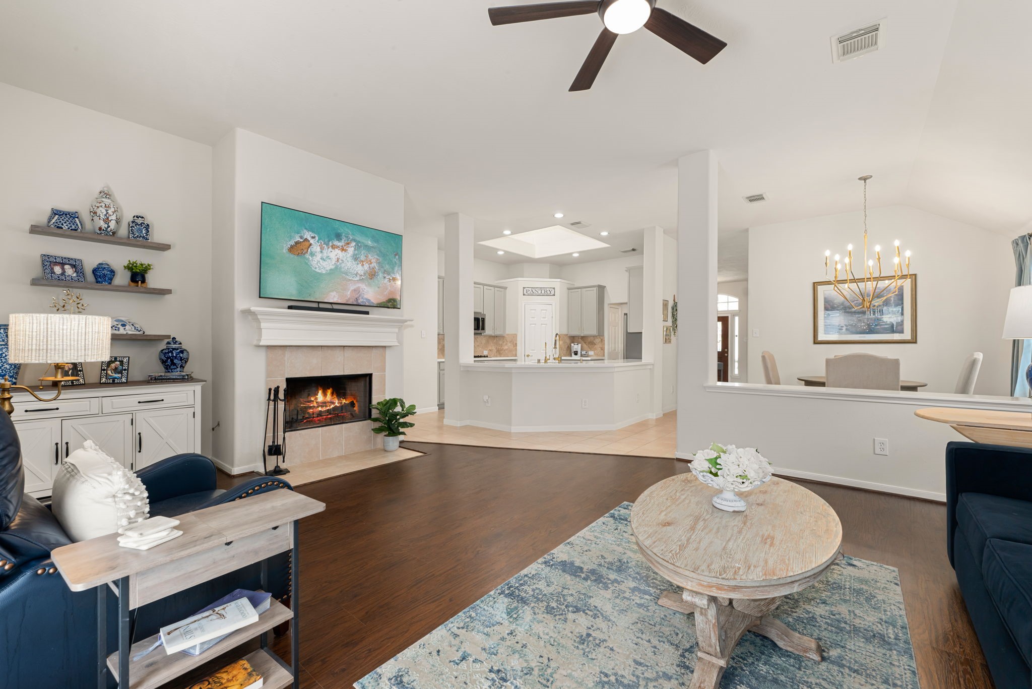 20707 Sapphire Lake Road Richmond, TX 77407 - Photo 11 of 35 Open-concept family room with fireplace.