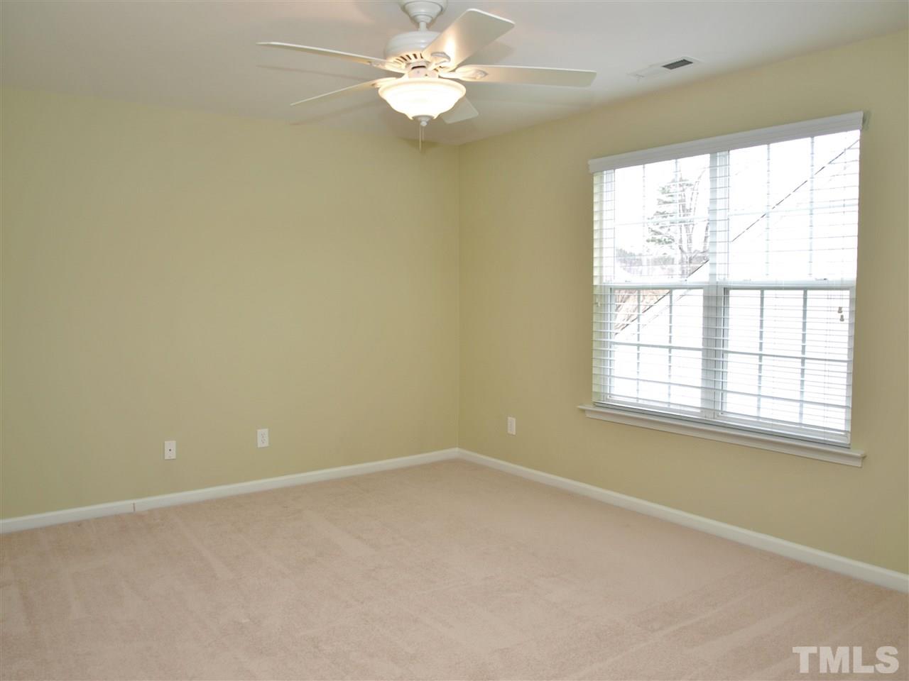 3609 Cathedral Bell Road Raleigh, NC 27614 - Photo 13 of 23 an empty room with a window