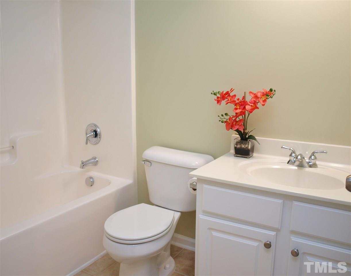 3609 Cathedral Bell Road Raleigh, NC 27614 - Photo 14 of 23 a bathroom with a sink toilet and a bathtub