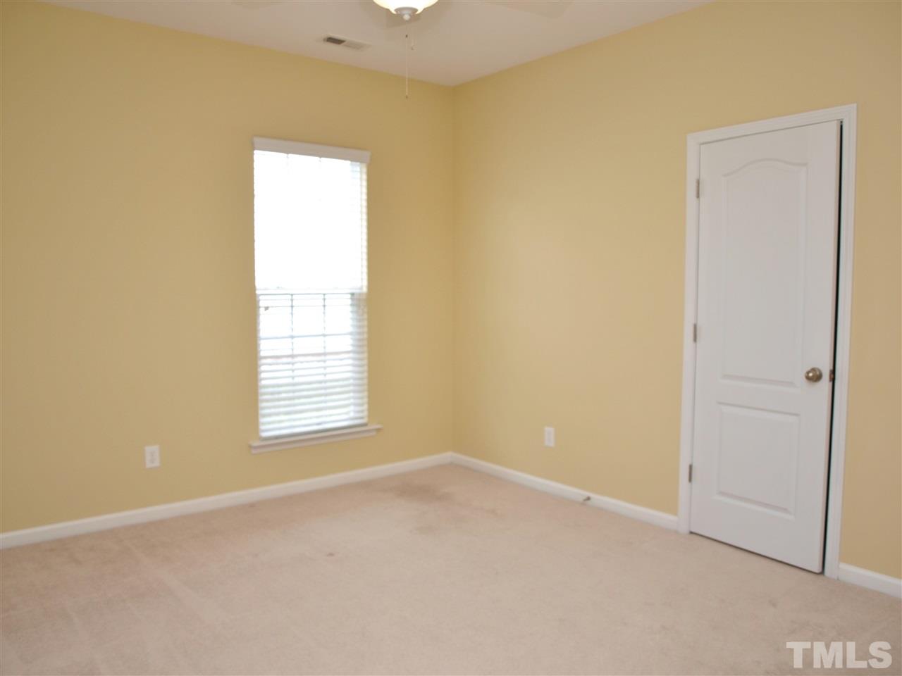 3609 Cathedral Bell Road Raleigh, NC 27614 - Photo 16 of 23 an empty room with a window