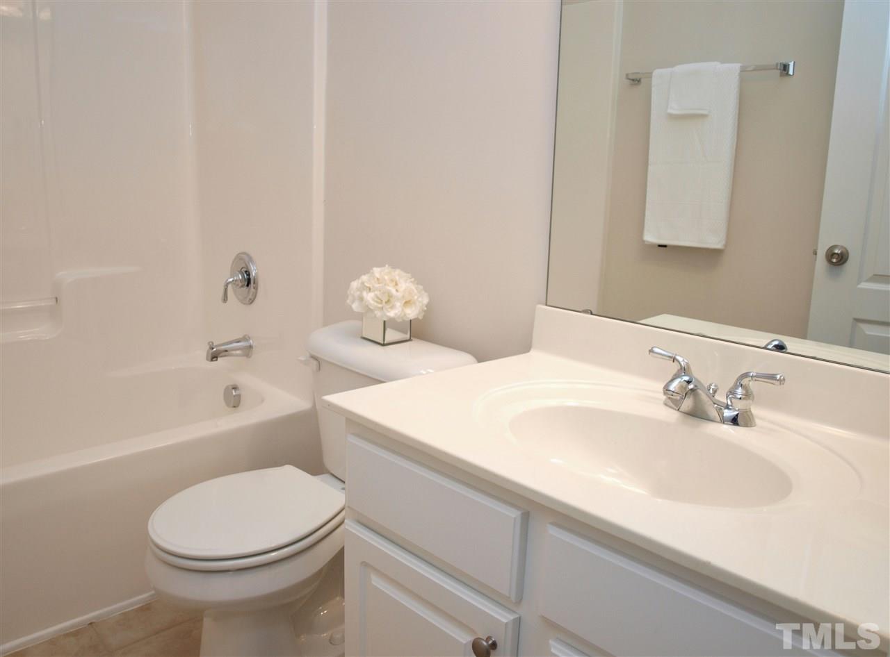3609 Cathedral Bell Road Raleigh, NC 27614 - Photo 17 of 23 a bathroom with a sink a toilet and bathtub