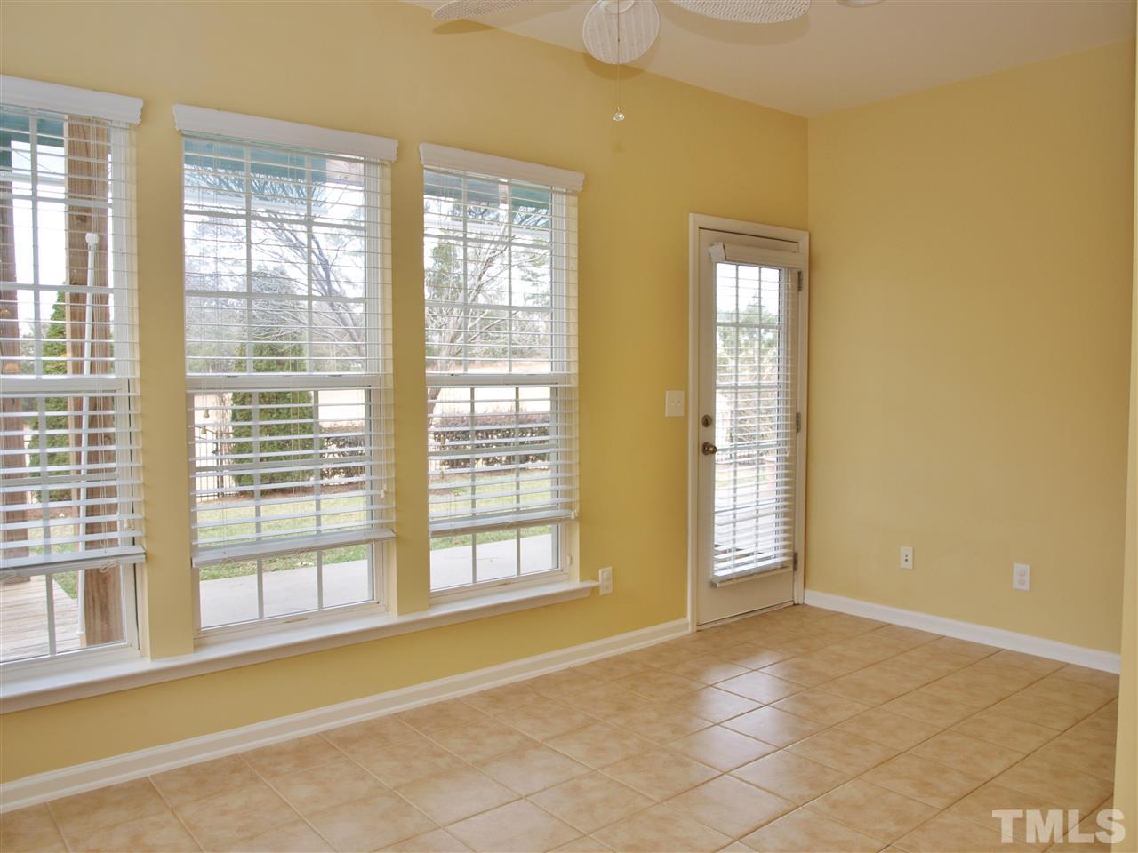 3609 Cathedral Bell Road Raleigh, NC 27614 - Photo 18 of 23 a view of an empty room with a window