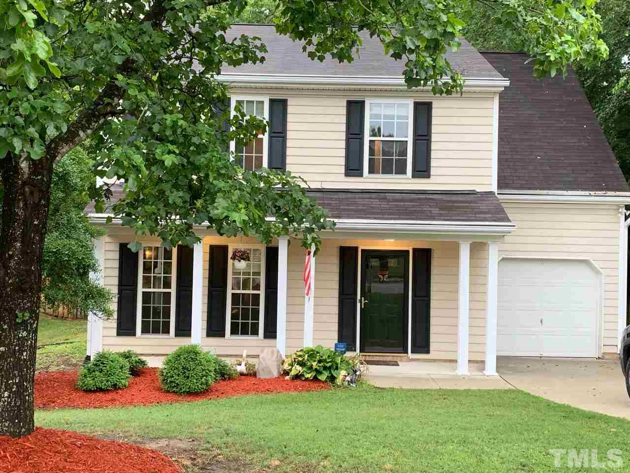 4516 Drewbridge Way Raleigh, NC 27604 - Photo 1 of 23 front view of a house with a yard