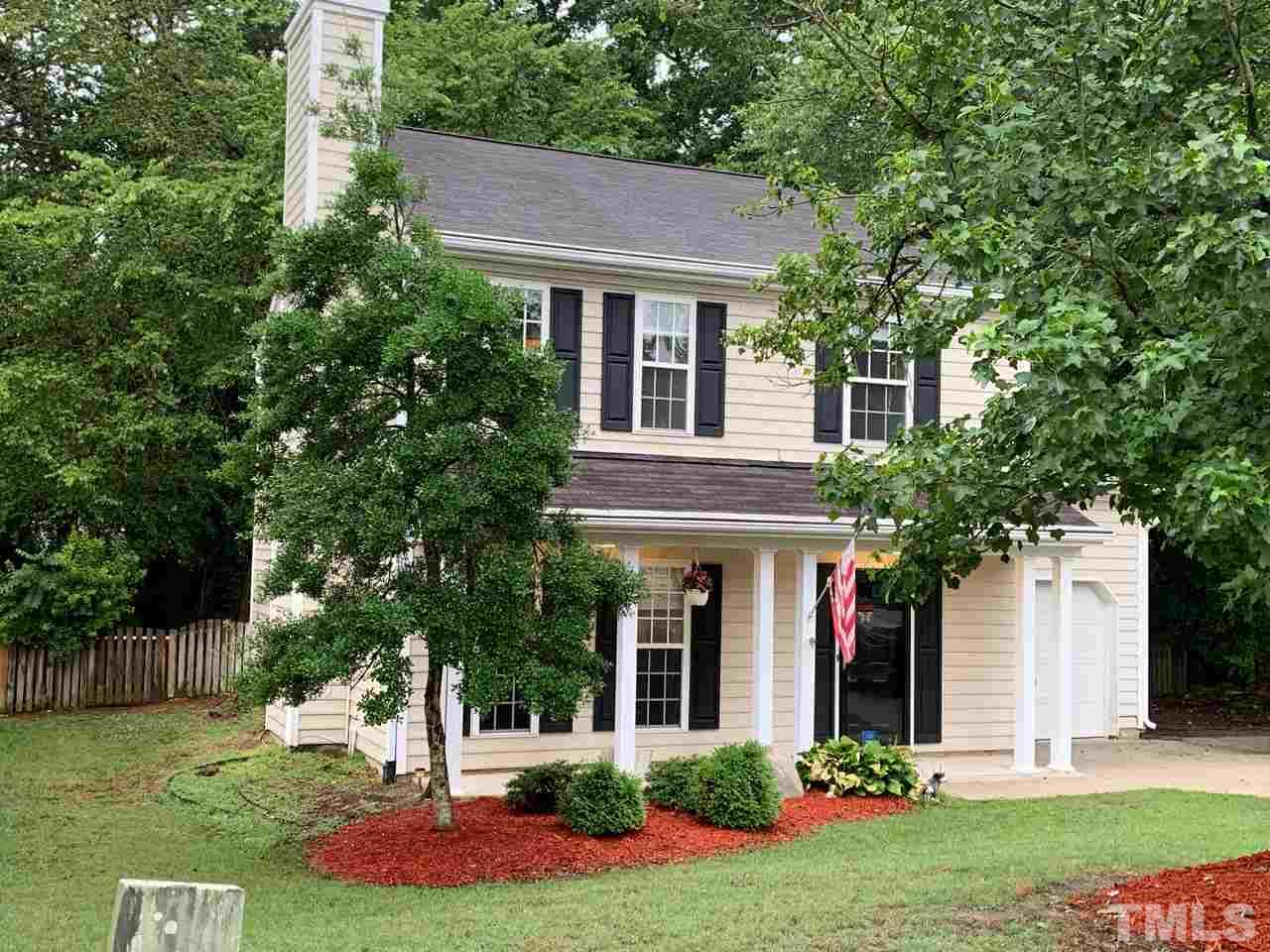 4516 Drewbridge Way Raleigh, NC 27604 - Photo 2 of 23 a house that has a tree in front of the house