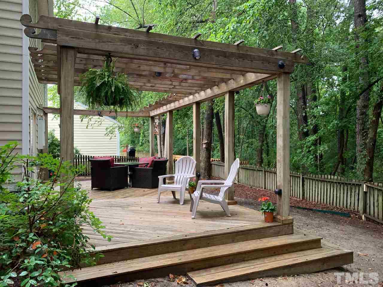 4516 Drewbridge Way Raleigh, NC 27604 - Photo 21 of 23 a view of outdoor space yard deck and furniture