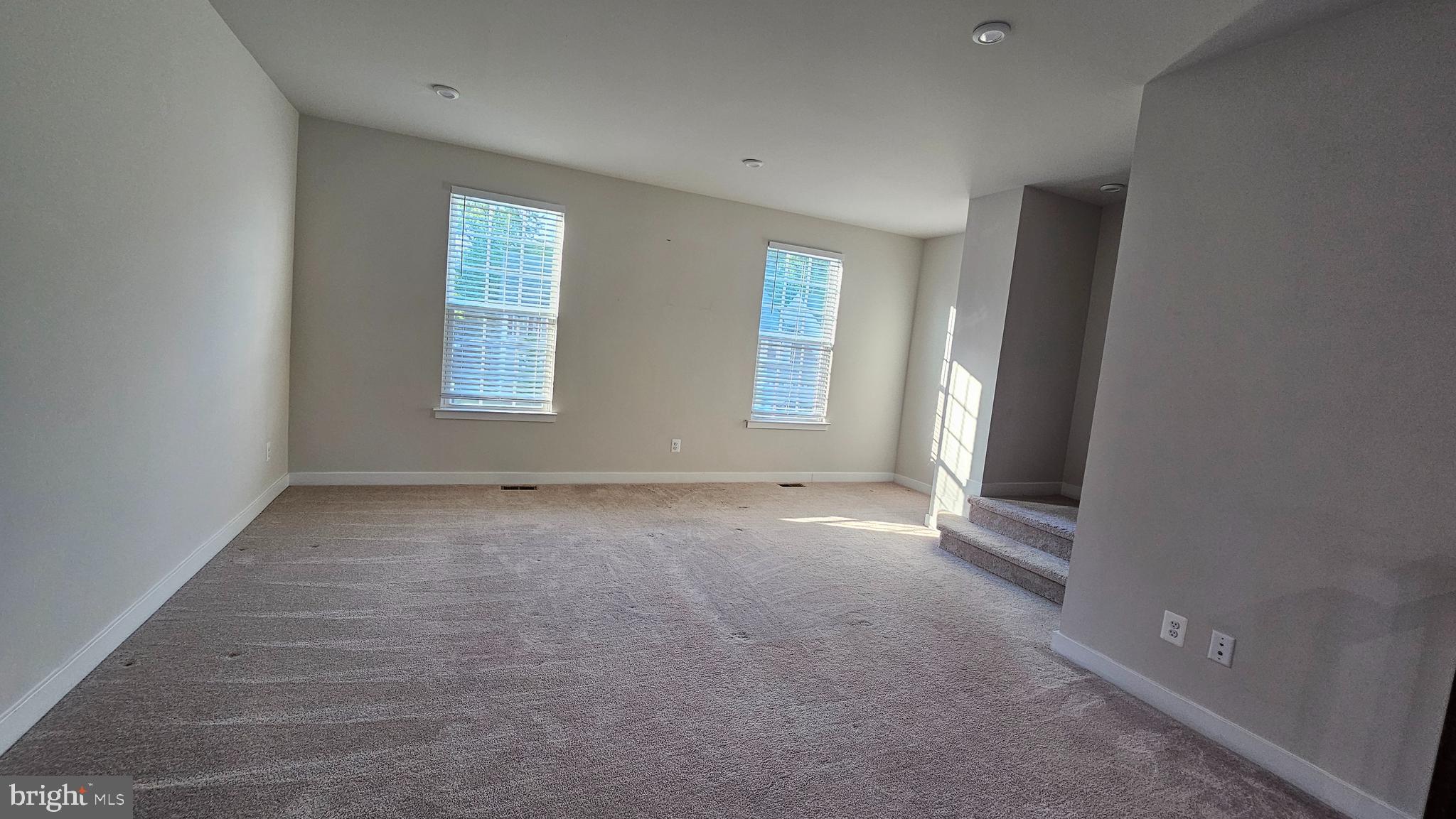 2055 Rivers Drive Newark, DE 19702 - Photo 23 of 48 an empty room with windows