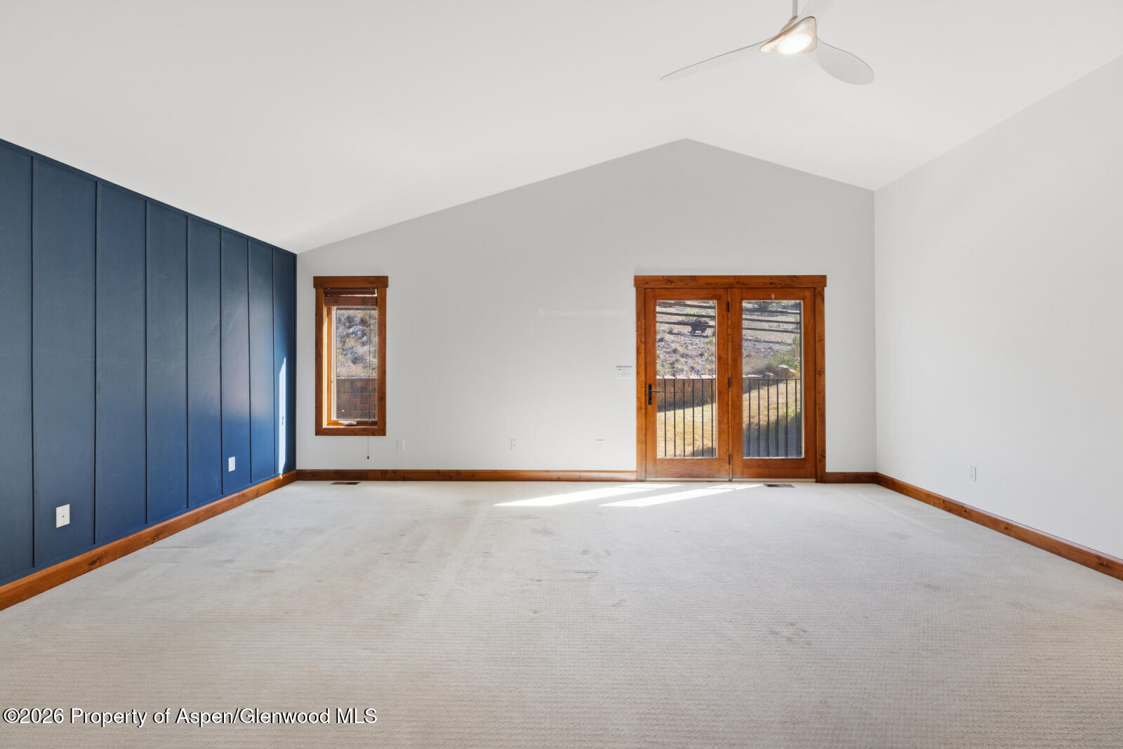 316 Faas Ranch Road New Castle, CO 81647 - Photo 22 of 50 a view of an empty room with window and wooden floor