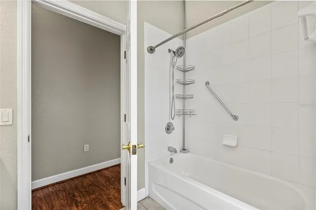 a view of an entryway with a floor to ceiling window