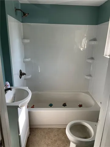 a view of a house with a patio