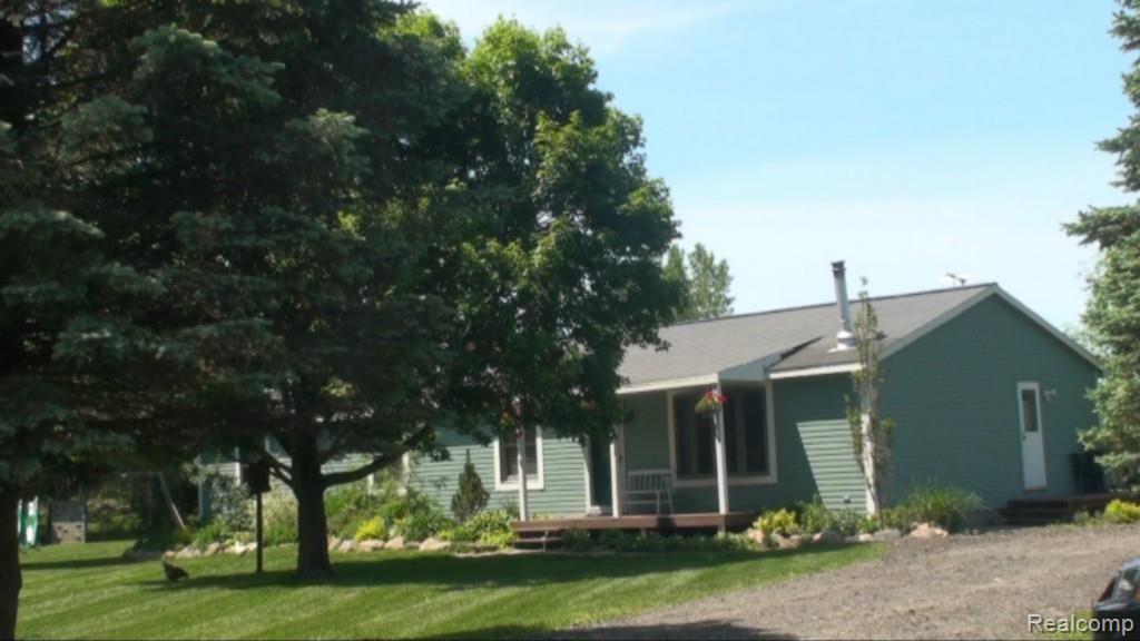 2136 Granger Road Oxford, MI 48371 - Photo 24 of 95 Large driveway and adjacent area for guest parking, RV, Boat--no HOA restrictions here.