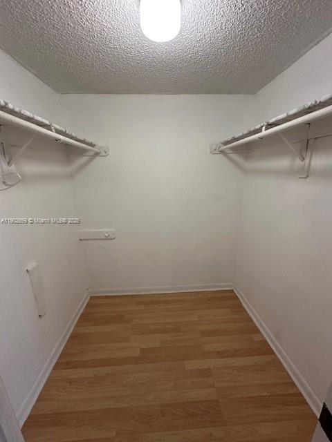 8015 Southwest 107th Avenue, Unit 201 Miami, FL 33173 - Photo 12 of 24 a view of a room with racks on the wall