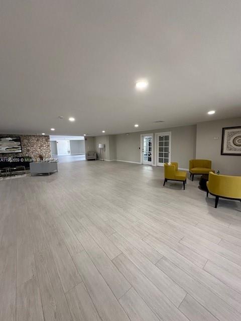 8015 Southwest 107th Avenue, Unit 201 Miami, FL 33173 - Photo 19 of 24 a living room with furniture and a table