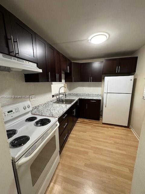 8015 Southwest 107th Avenue, Unit 201 Miami, FL 33173 - Photo 2 of 24 a kitchen that has a sink and a stove