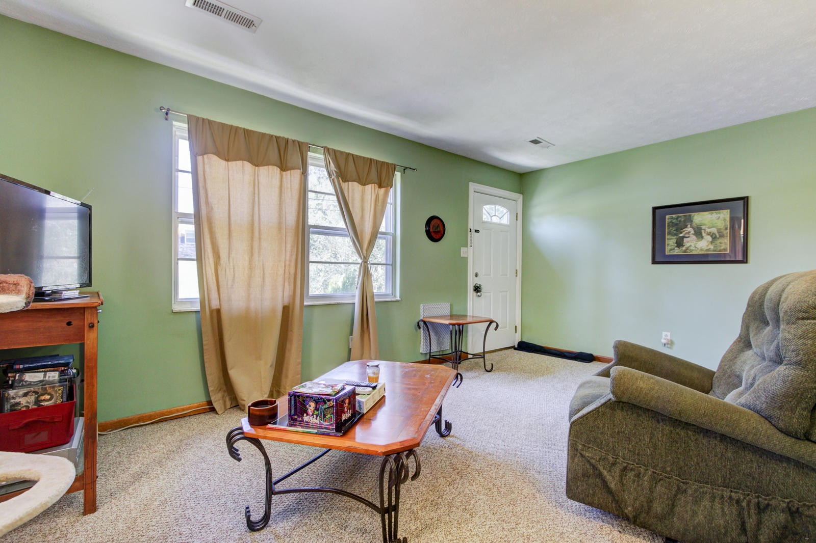 4422 Sullivan Road Knoxville, TN 37921 - Photo 7 of 15 a living room with furniture and a window