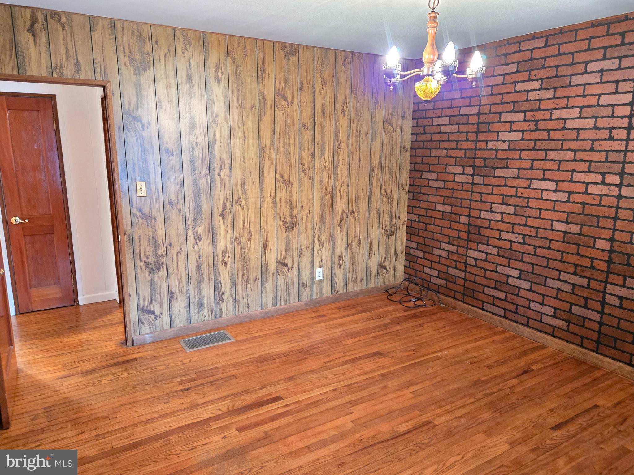 8193 Gumtree Drive Dundalk, MD 21222 - Photo 11 of 26 a view of a livingroom with wooden floor