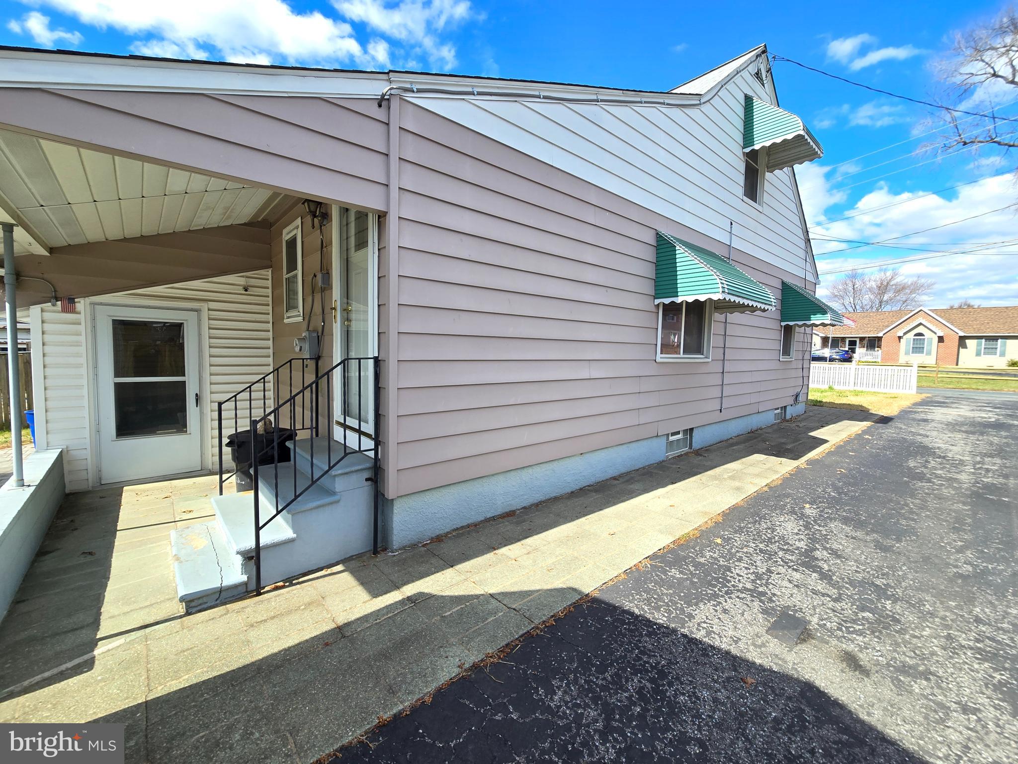 8193 Gumtree Drive Dundalk, MD 21222 - Photo 24 of 26 a view of a house with backyard and sitting area