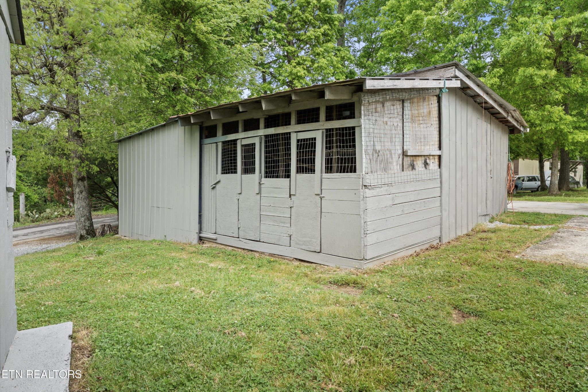 292 Buckner Road Philadelphia, TN 37846 - Photo 31 of 38 a view of a house with a yard