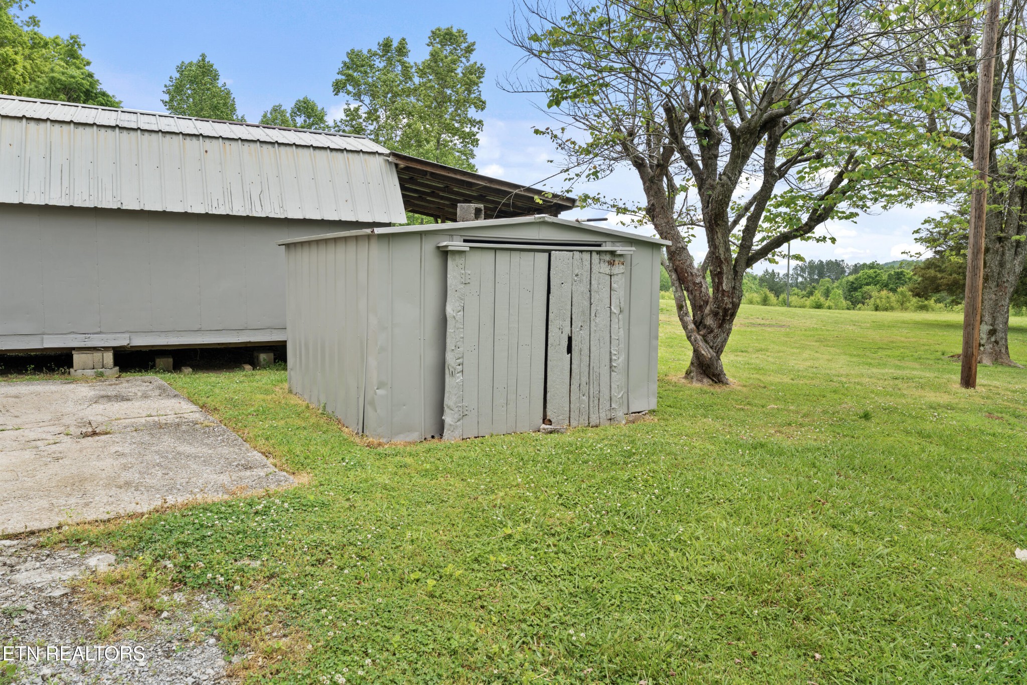 292 Buckner Road Philadelphia, TN 37846 - Photo 32 of 38 a view of a backyard