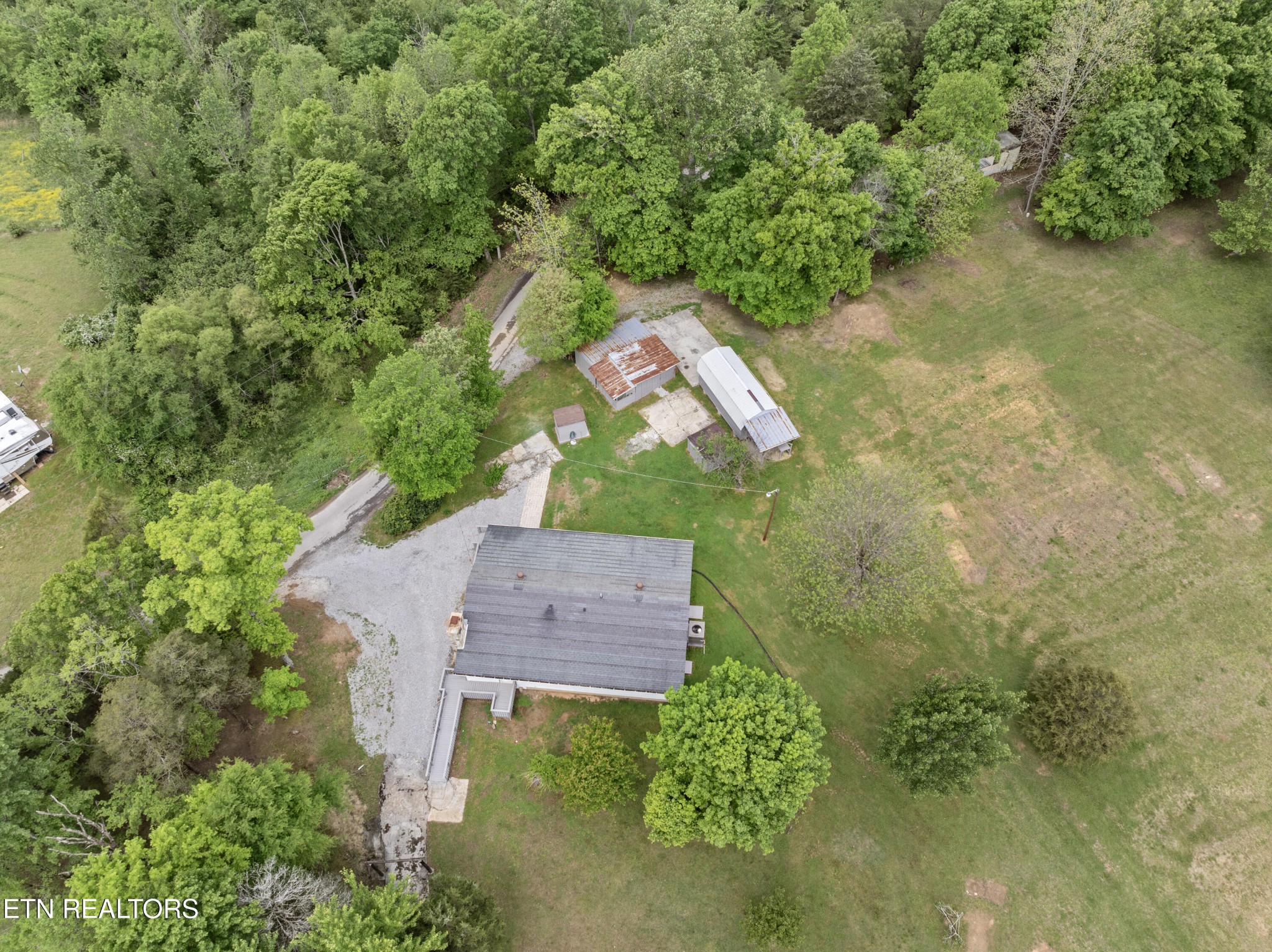 292 Buckner Road Philadelphia, TN 37846 - Photo 5 of 38 an aerial view of a house with a yard