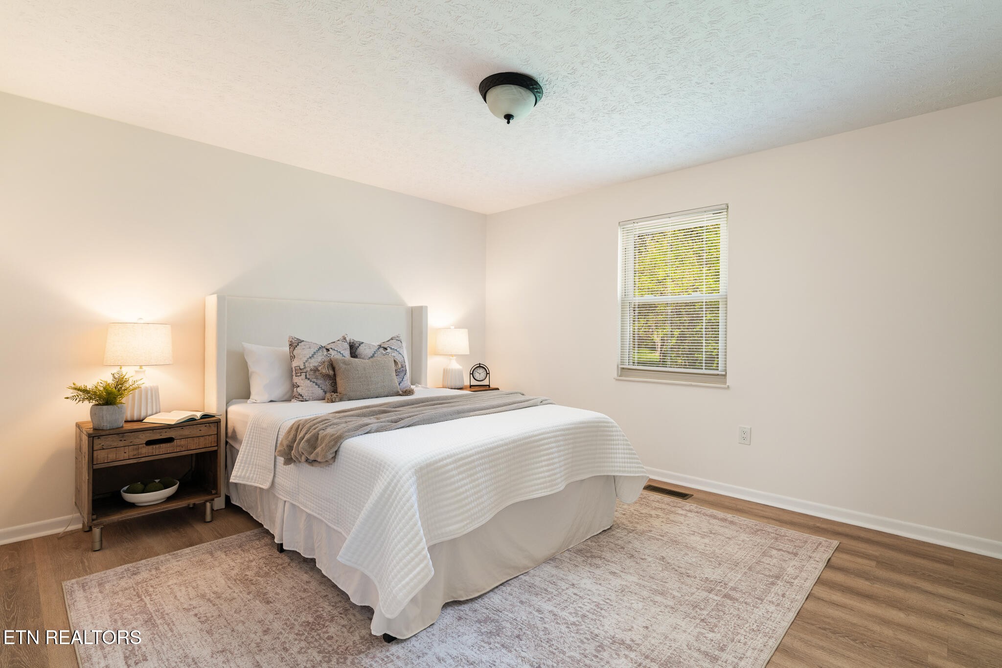 520 Harrow Road Knoxville, TN 37934 - Photo 16 of 42 a bedroom with a bed and a window