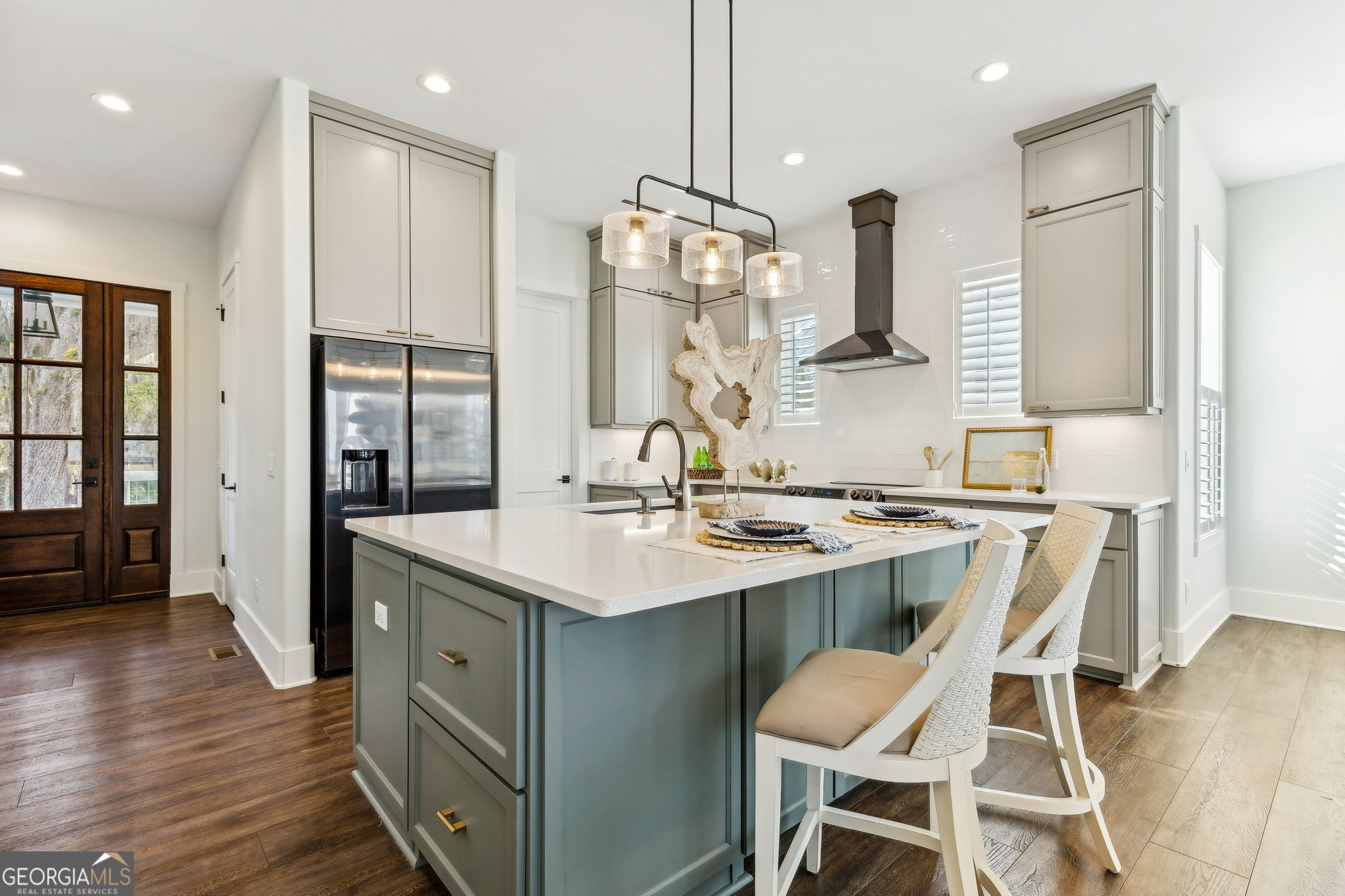 109 Becket Road St. Marys, GA 31558 - Photo 13 of 65 a kitchen with a sink cabinets and wooden floor