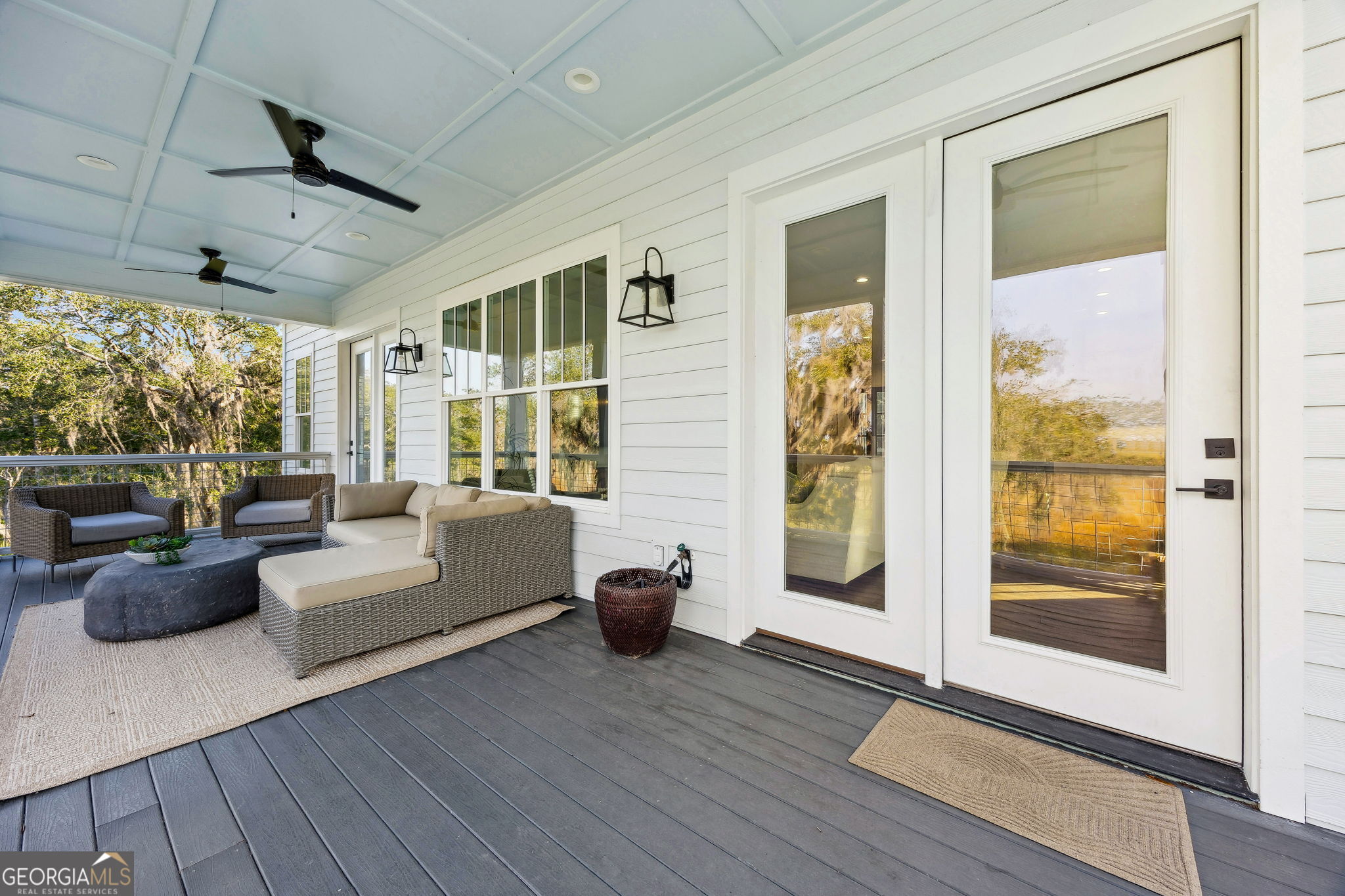 109 Becket Road St. Marys, GA 31558 - Photo 24 of 65 a living room with furniture and large windows