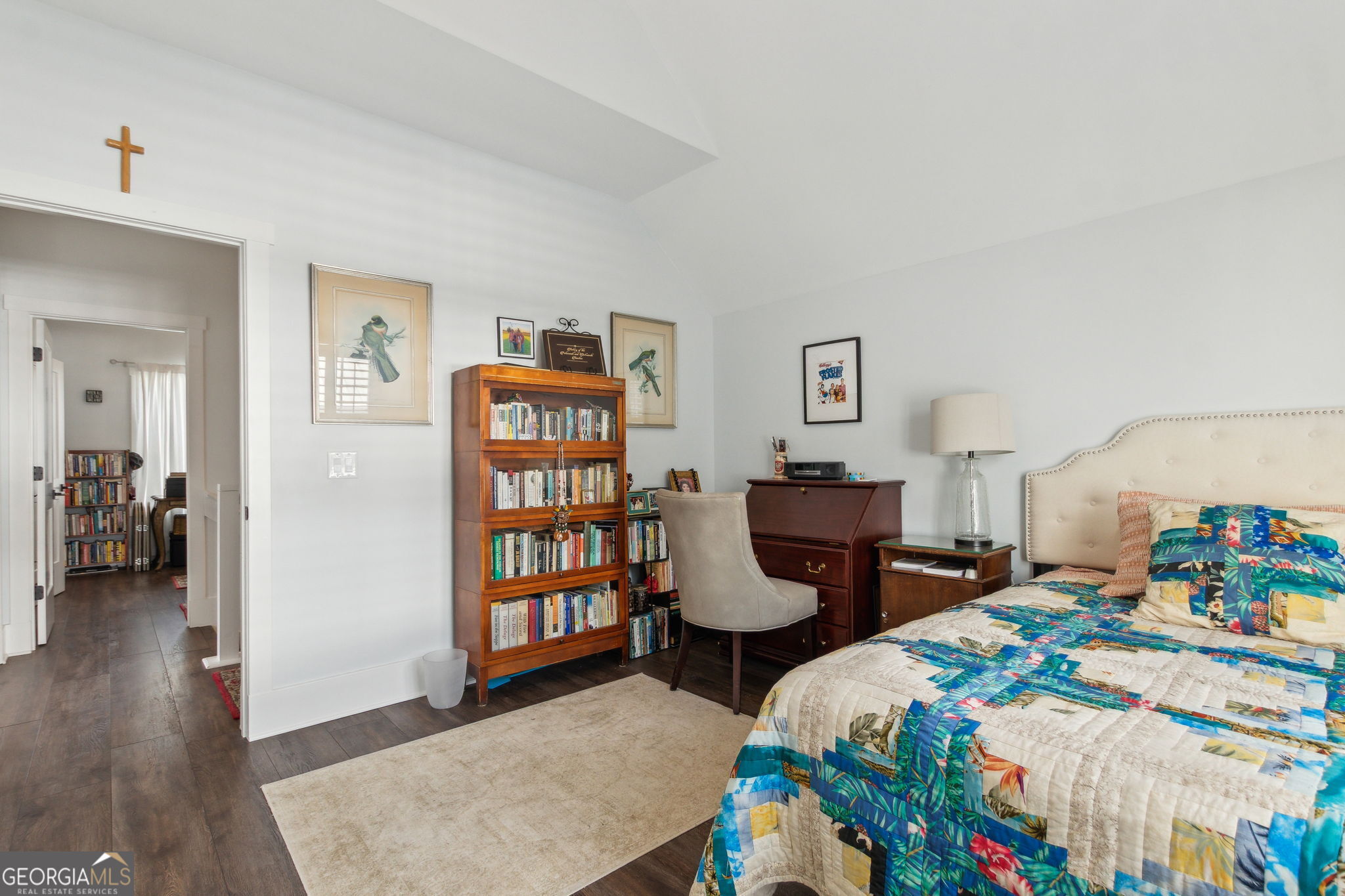 109 Becket Road St. Marys, GA 31558 - Photo 30 of 65 a bedroom with bed and a book shelf