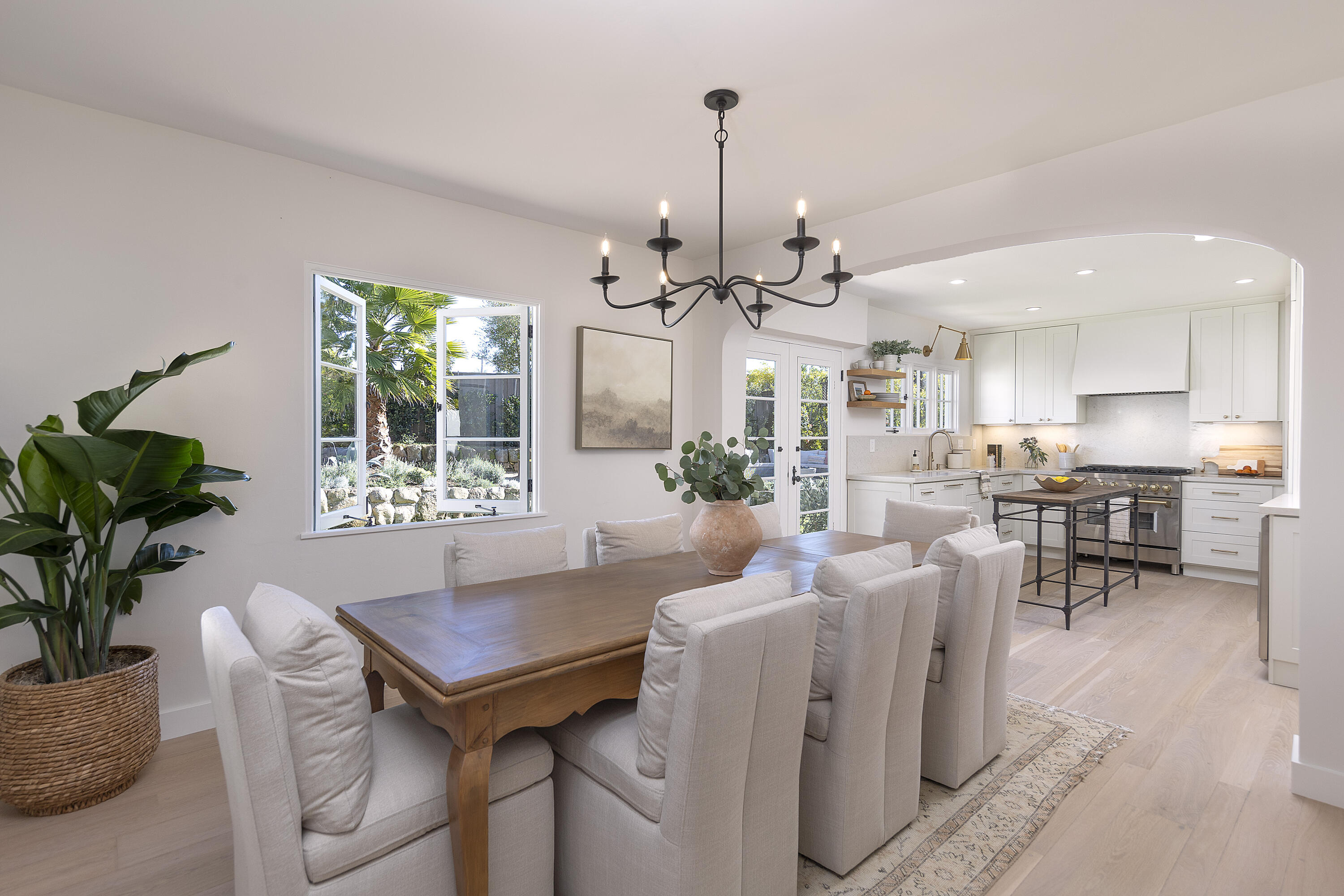 909 Chelham Way Montecito, CA 93108 - Photo 14 of 28 a view of a dining room with furniture and a chandelier