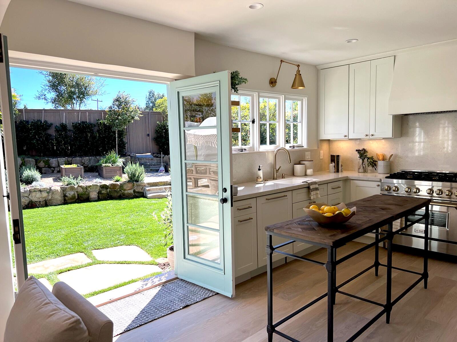 909 Chelham Way Montecito, CA 93108 - Photo 16 of 28 a living room with furniture and a flat screen tv