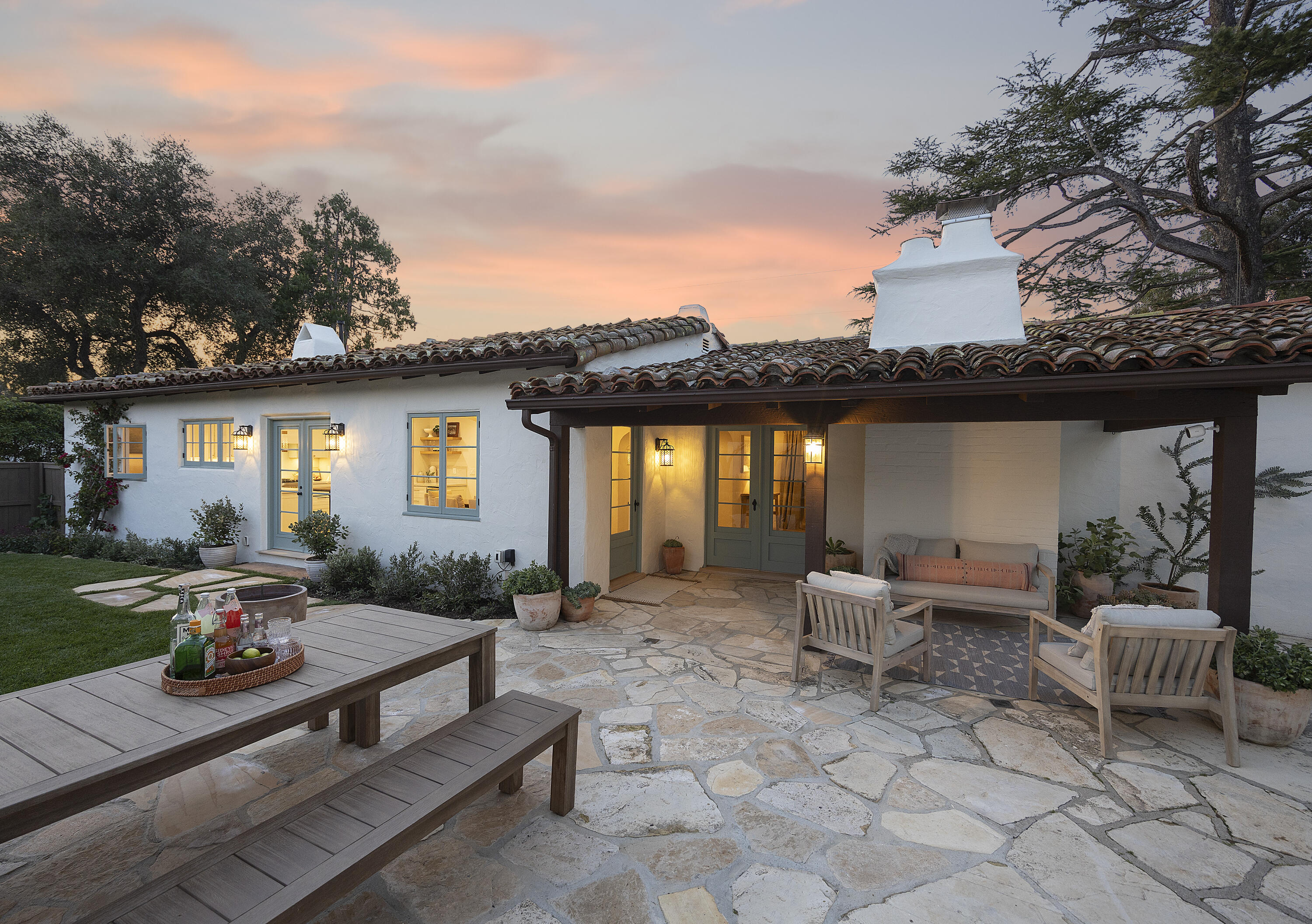 909 Chelham Way Montecito, CA 93108 - Photo 3 of 28 a view of a house with backyard and sitting area