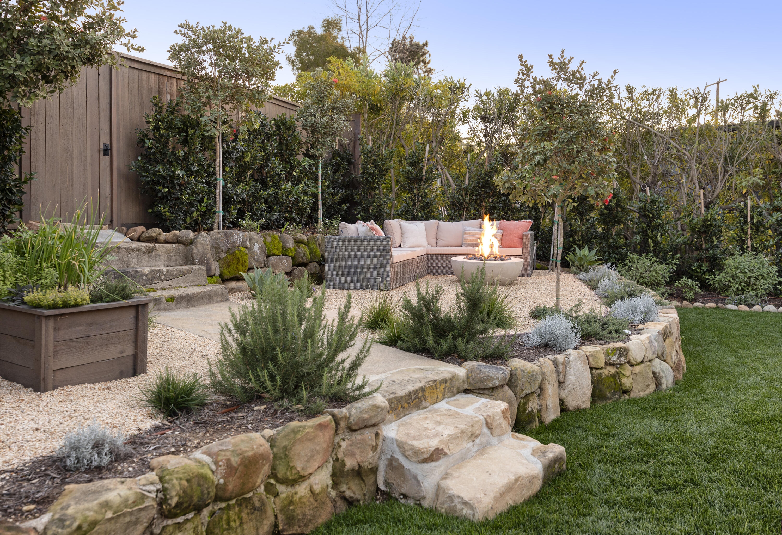 909 Chelham Way Montecito, CA 93108 - Photo 6 of 28 a view of a garden with patio