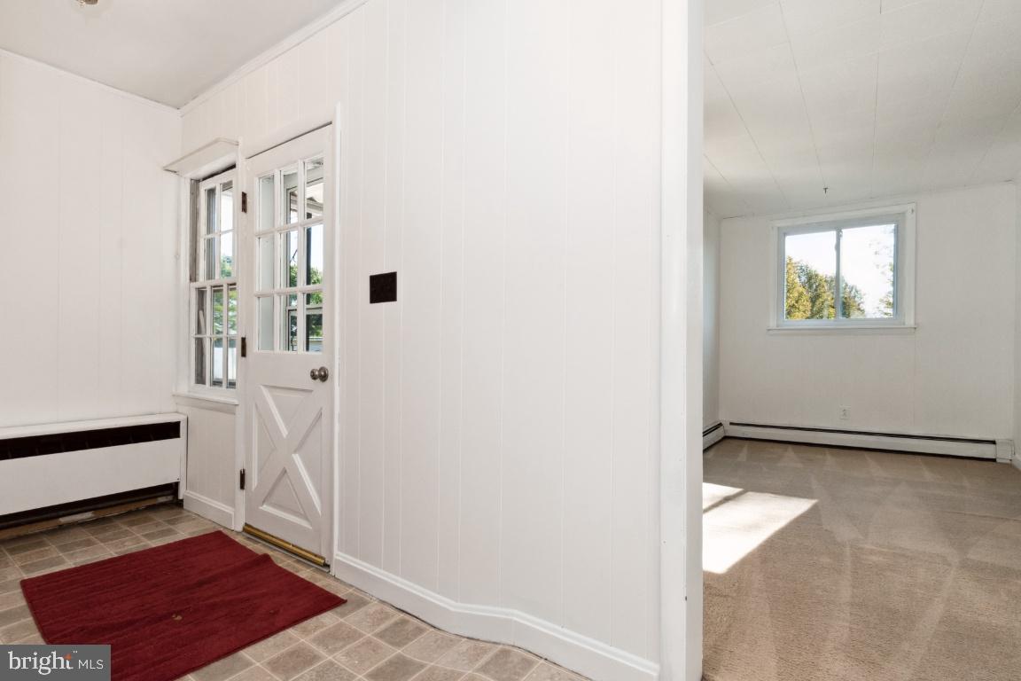 615 Hanover Pike Hampstead, MD 21074 - Photo 14 of 35 a view of an entryway with front door