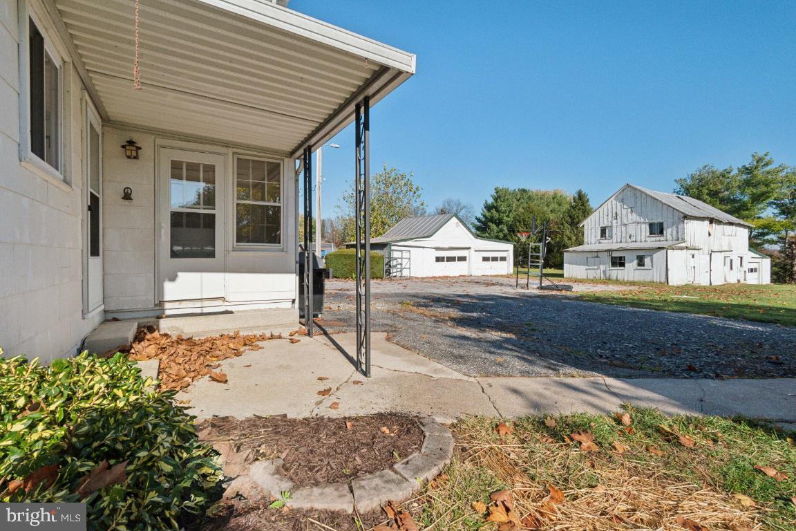 615 Hanover Pike Hampstead, MD 21074 - Photo 30 of 35 a front view of a house with a yard