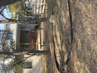 7371 Miller Creek Loop Johnson City, TX 78636 - Photo 1 of 37 a front view of a house with a yard