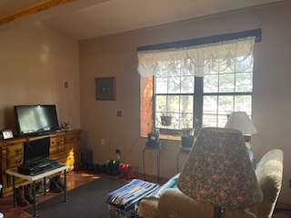 7371 Miller Creek Loop Johnson City, TX 78636 - Photo 11 of 37 a living room with furniture and a flat screen tv