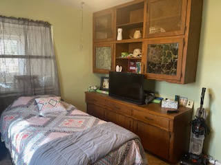 7371 Miller Creek Loop Johnson City, TX 78636 - Photo 13 of 37 a bedroom with a bed and a window