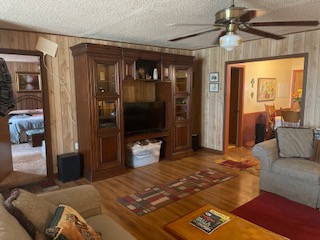 7371 Miller Creek Loop Johnson City, TX 78636 - Photo 7 of 37 a bedroom with a bed and a flat screen tv