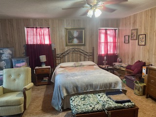 7371 Miller Creek Loop Johnson City, TX 78636 - Photo 10 of 37 a bedroom with a bed and balcony view