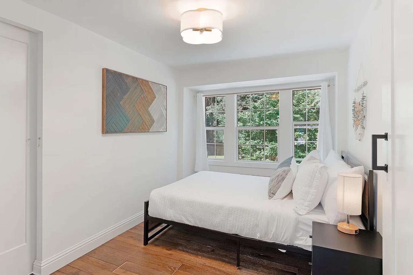 1003 Laurel Glen Road Soquel, CA 95073 - Photo 31 of 101 a bedroom with a bed and a window