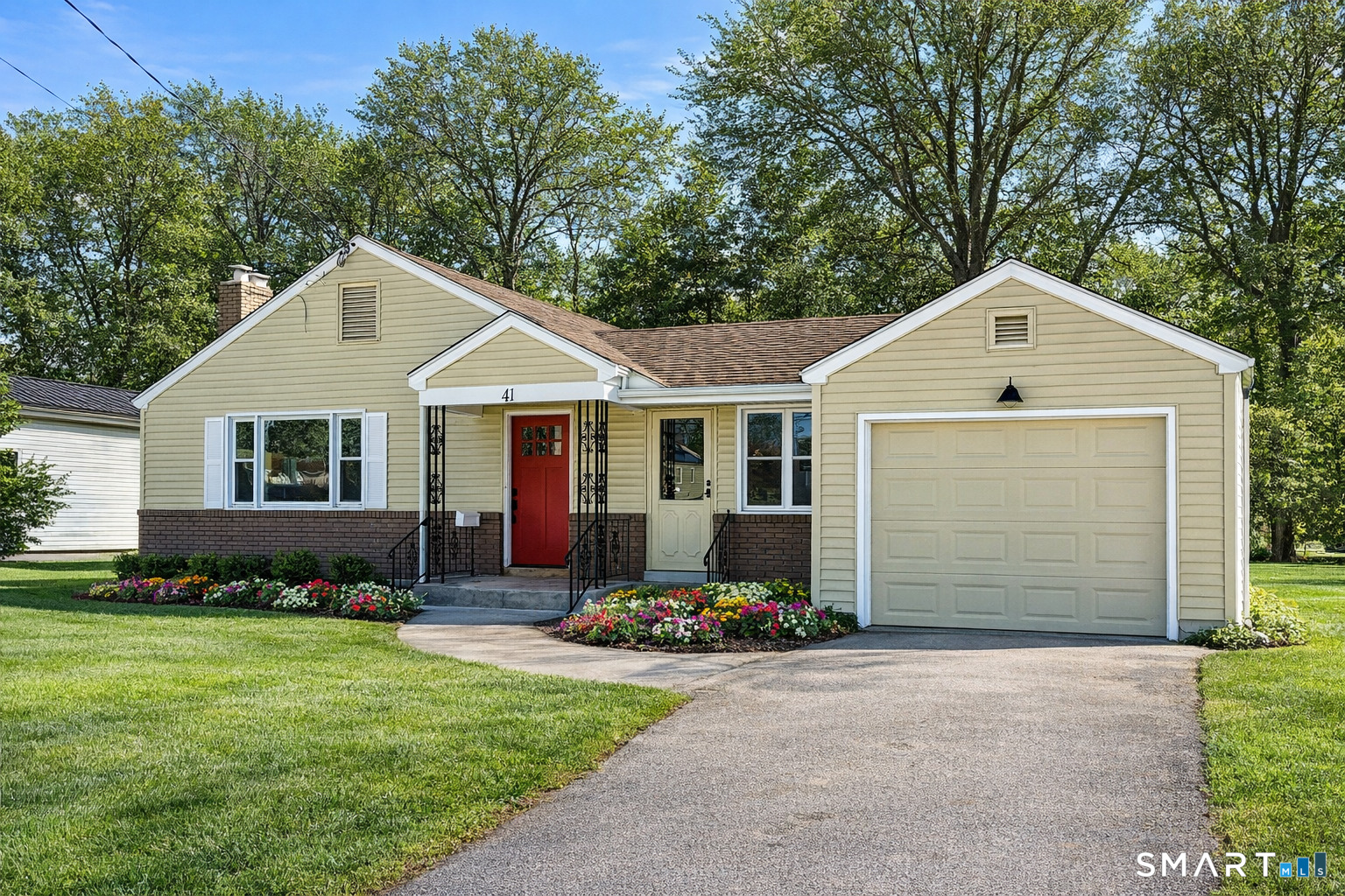 41 Haynes Road West Hartford, CT 06117 - Photo 2 of 46 Greenery and flowers virtually added.