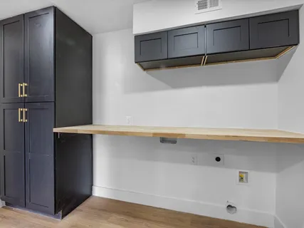 a balcony of view with wooden floor