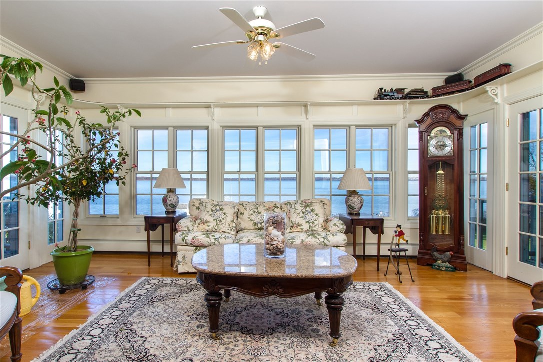 1046 East Shore Road Jamestown, RI 02835 - Photo 12 of 29 Sun filled room with French doors to the decks