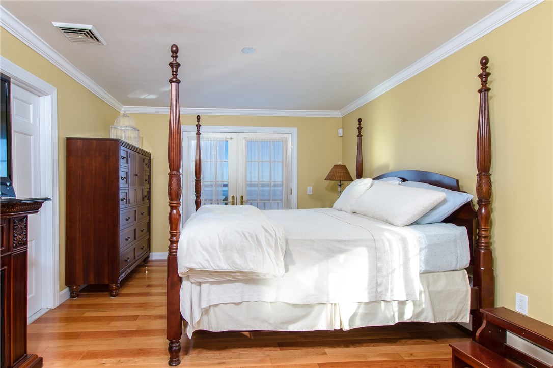 1046 East Shore Road Jamestown, RI 02835 - Photo 19 of 29 2nd level master suite offers a private balcony, sitting area and private bath, with multiple closets